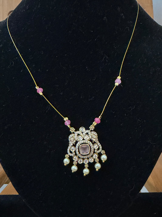 Invisible necklace with pastel soft pink stone