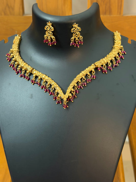 V shaped necklace with ruby color pearl hanging : Code RJ1250