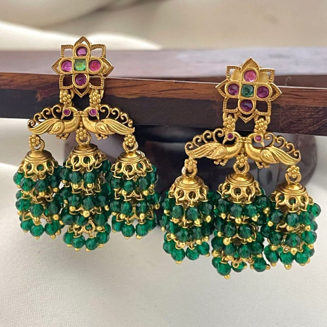 Gold-Finish Ruby Jhumka Earrings | Peacock Design Temple Jewellery for Weddings & Festive Wear EK