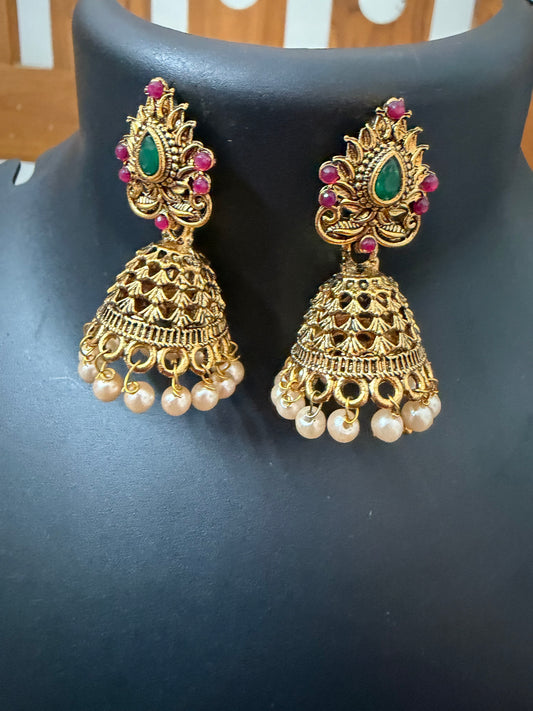 Temple jewelry Jhumka with green center stone and pearl hanging