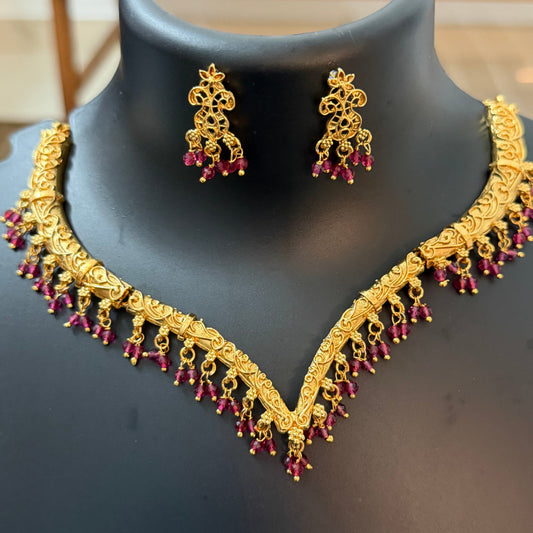 V shaped necklace with ruby color pearl hanging : Code RJ1250