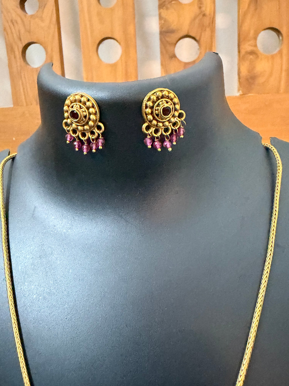 Haram red stone center locket