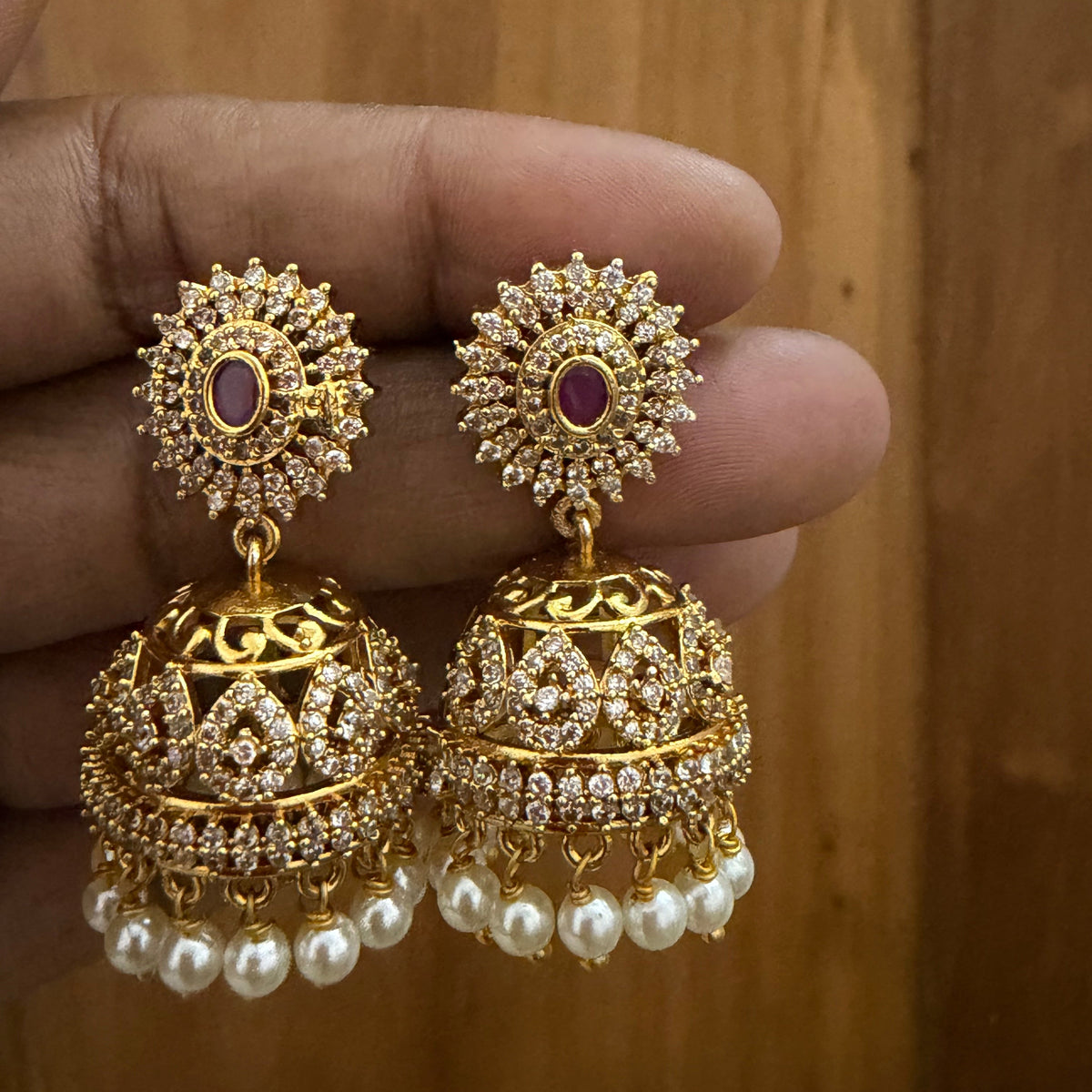 AD stone Jhumka with pearl hanging