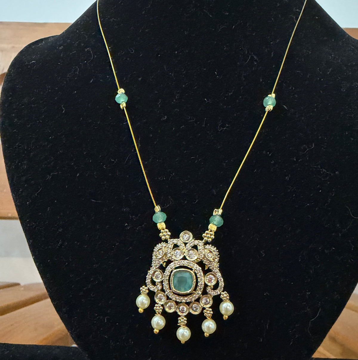 Invisible necklace with Mint green locket