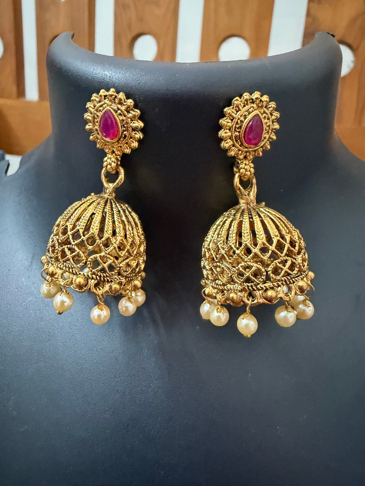 Temple jewelry Jhumka with red center stone and pearl hanging