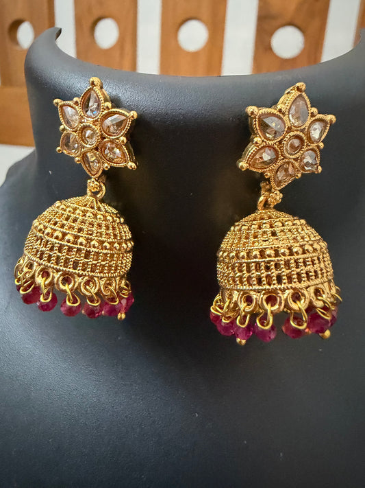 AD stone Jhumka star stud and ruby stones