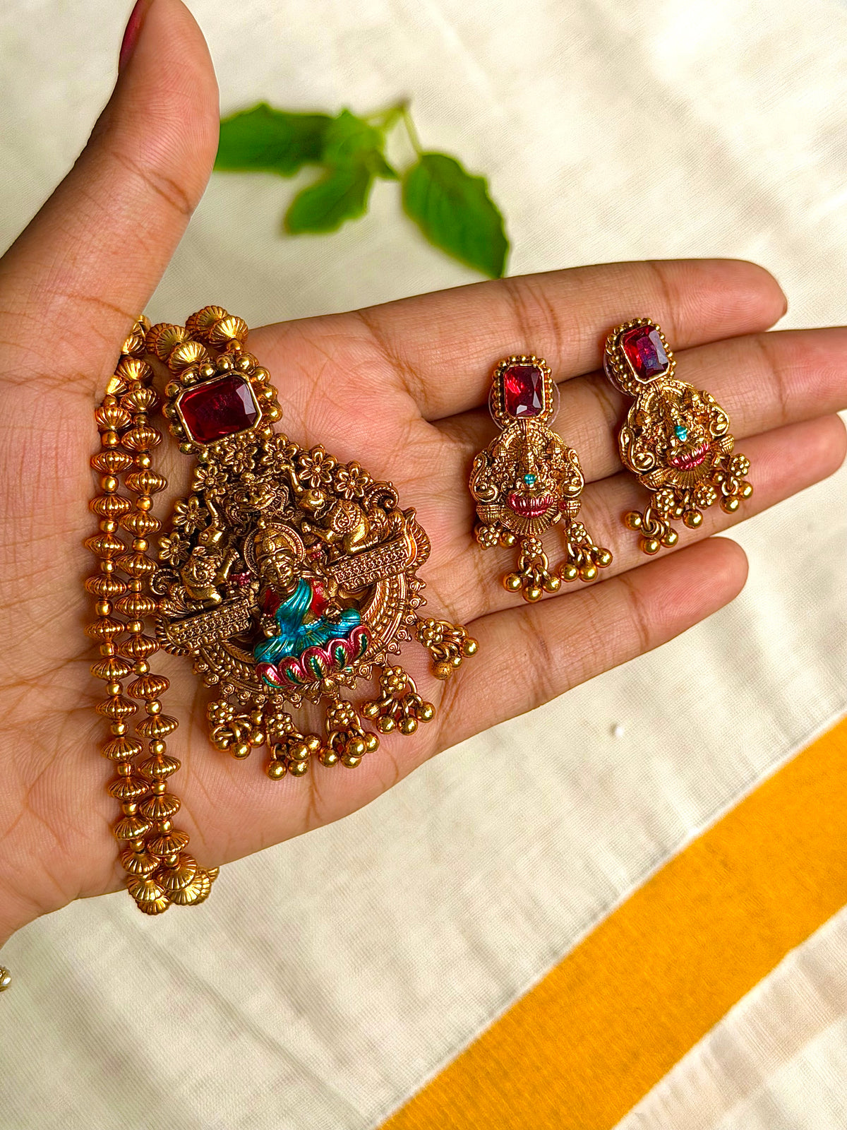 Premium antique-finish Goddess Lakshmi temple necklace and earrings set | Code: KP5001