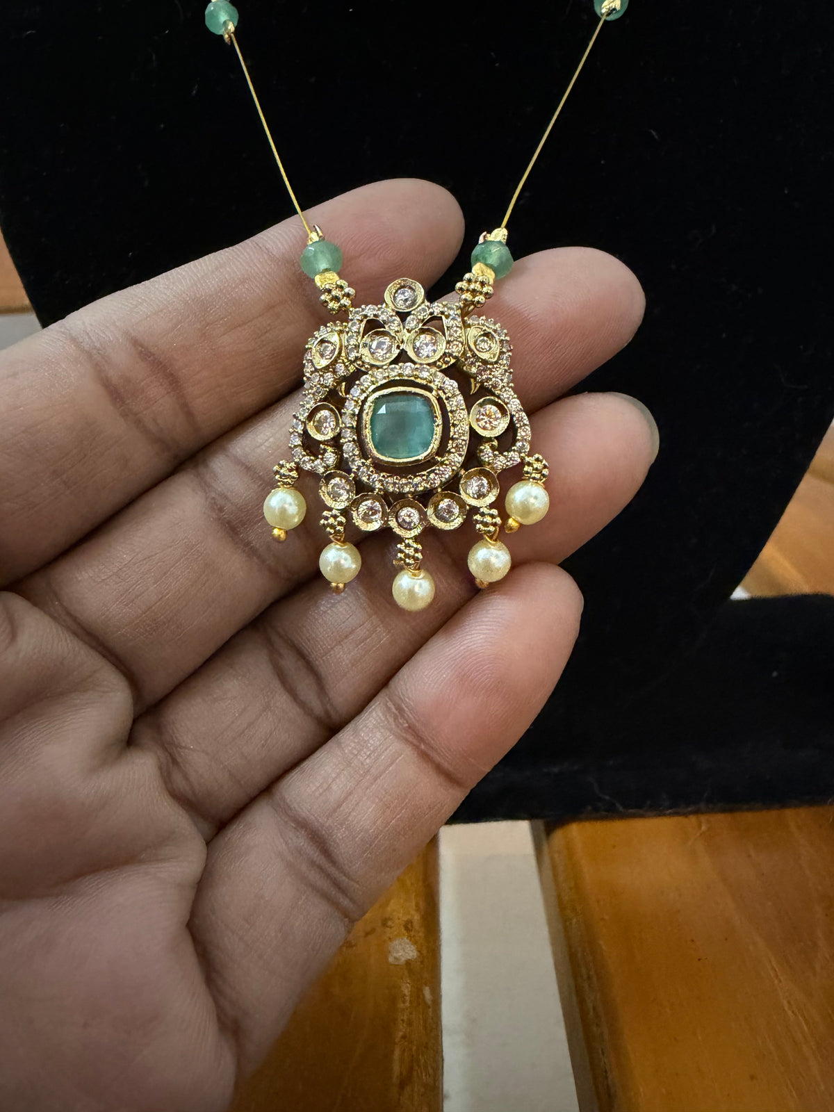 Invisible necklace with Mint green locket